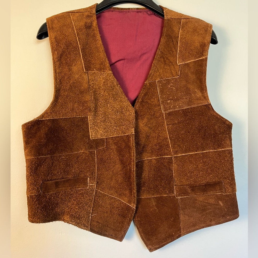 Vintage patchwork leather vest.